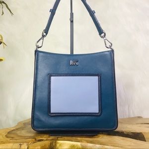 Michael Kors Gloria Pocket Swing Pack Crossbody